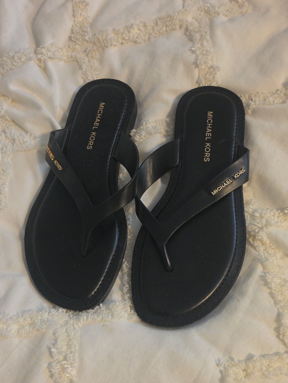 Michael Kors Black Slip-On Thong Sandals with Gold Logo